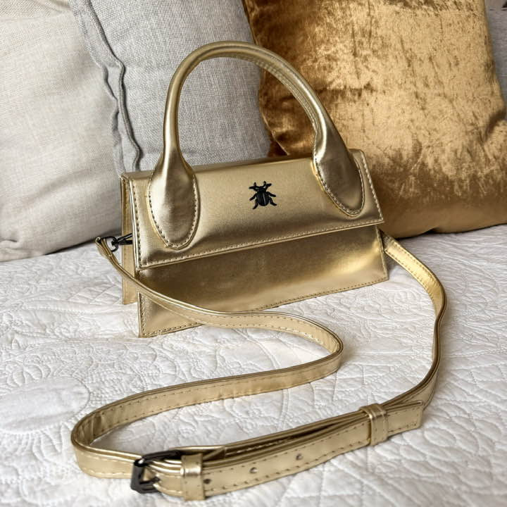 Dione Long Oro Herraje Negro