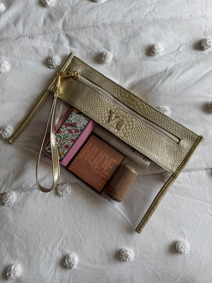 Cosmetiquera Clutch Pitón Champagne Metálico