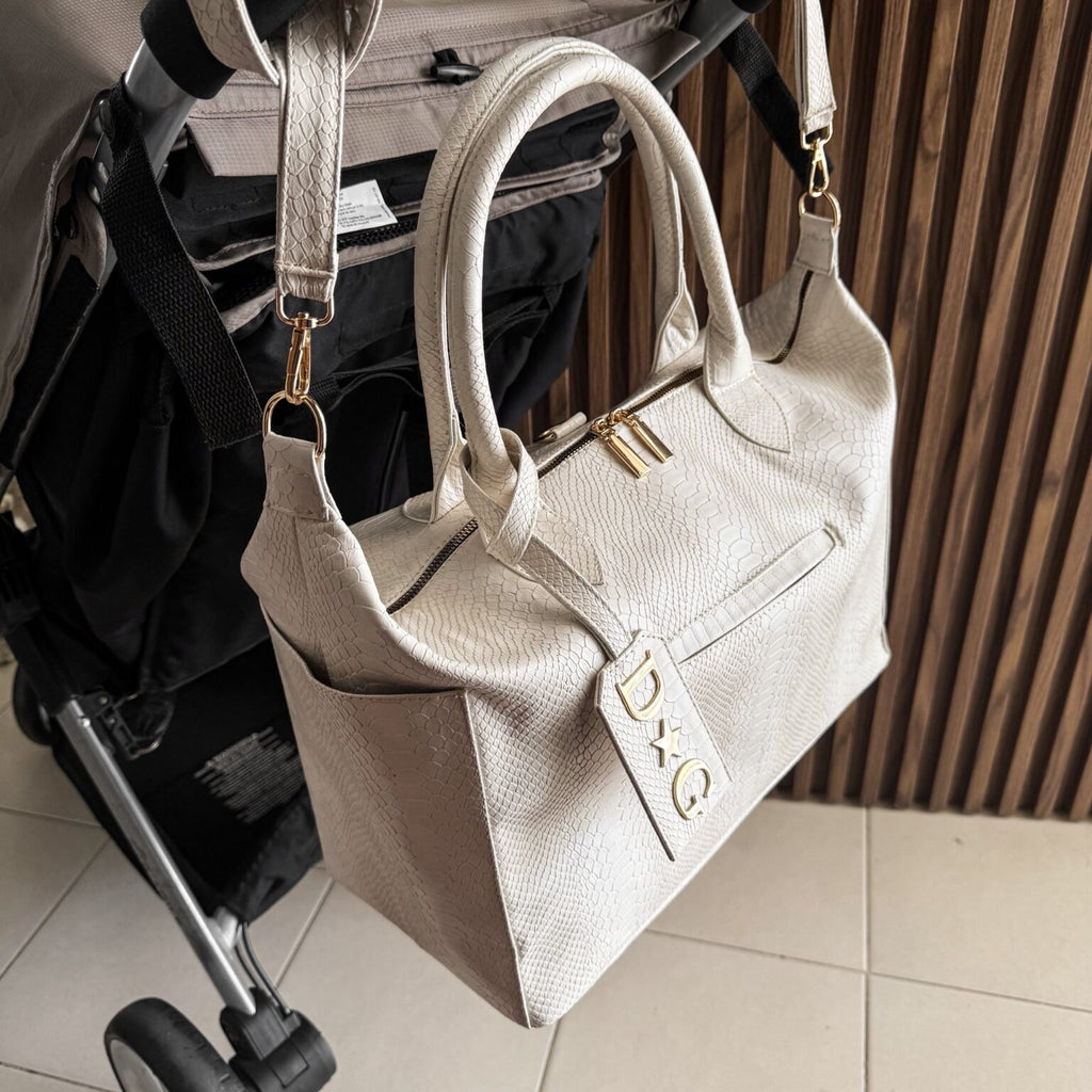 Pañalera Baby Bag Pitón Crema Herraje oro