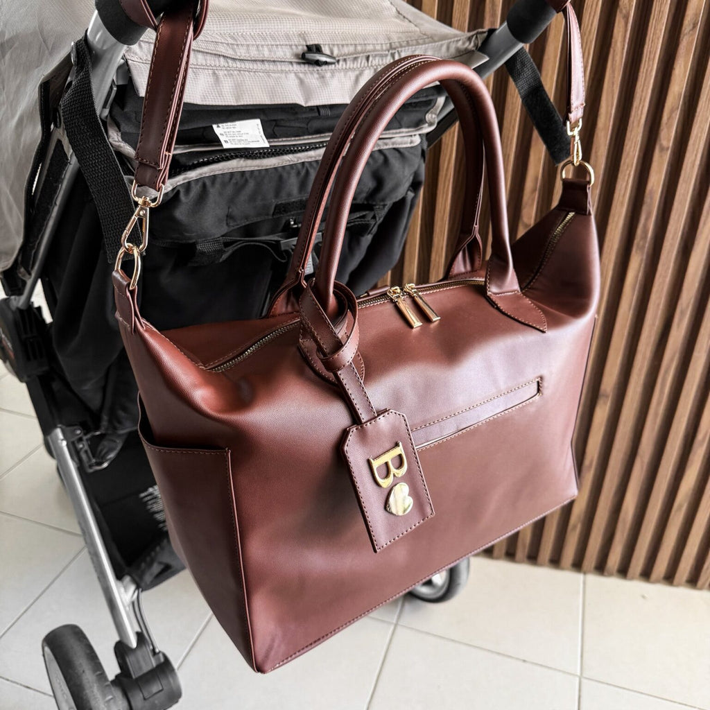 Pañalera Baby Bag Comino Herraje Oro