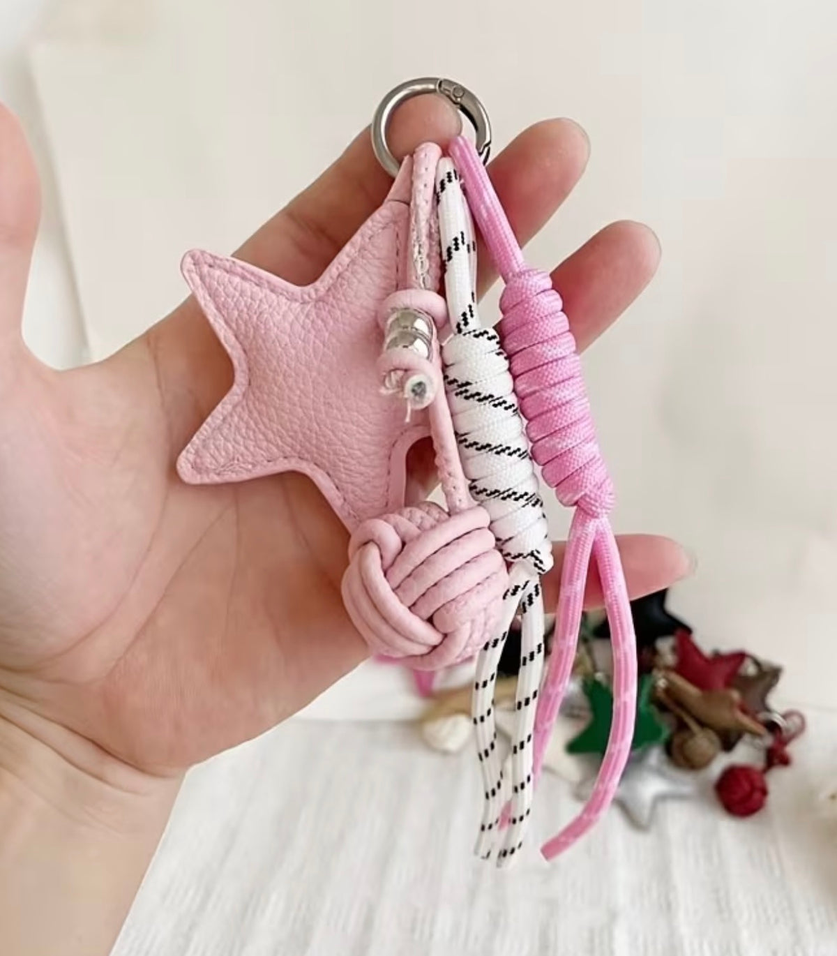 Charm estrella rosa