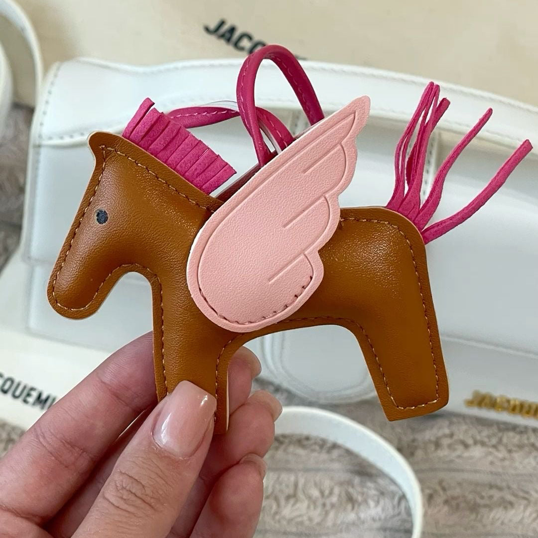 Charm para bolso caballitos naranja y rosa